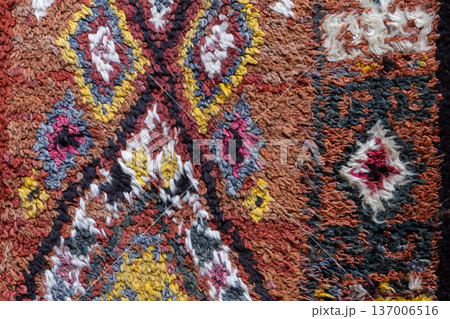 Colorful Uzbek woolen carpet, macro photo 137006516