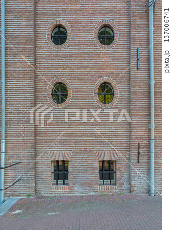 Symmetric Windows Brick Building 137006741