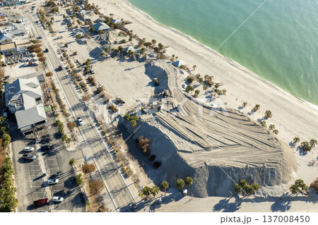 Hurricane Milton aftermath cleanup. Sand recipient site for residents to dump sand after storm surge. Huge sand piles at Englewood Beach on Manasota Key 137008450