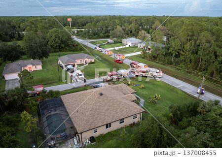 Firefighters investigating fire hazard on residential street in North Port in Florida 137008455