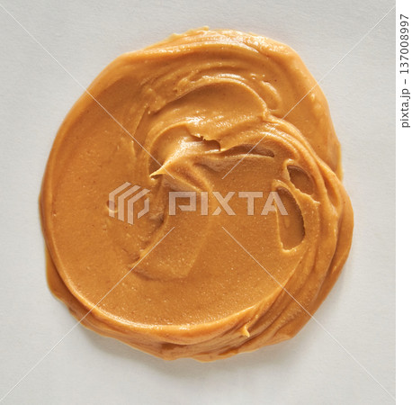 Smooth Peanut Butter Swirl On White Background, Capturing Creamy And Nutritious Texture Smooth Peanut Butter Swirl On White Background, Capturing Creamy And Nutritious Texture 137008997