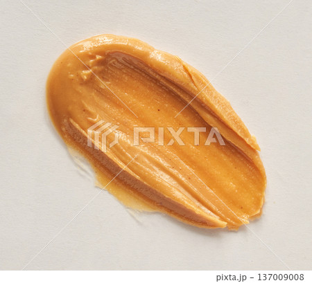 Smooth Peanut Butter Spread On White Background Highlighting Creamy Texture And Rich Flavor 137009008