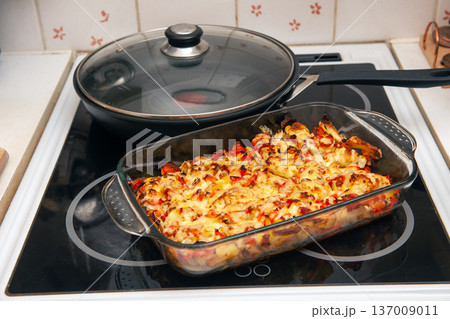 Casserole of Cauliflower with Chicken and Vegetables. 137009011