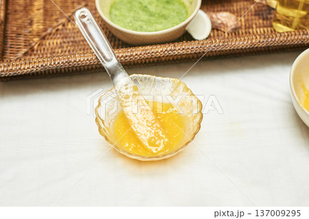 Organic Skincare Ingredients Honey Mask And Green Herbal Mixture In Decorative Bowls On White Organic Skincare Ingredients Honey Mask And Green Herbal Mixture In Decorative Bowls On White 137009295