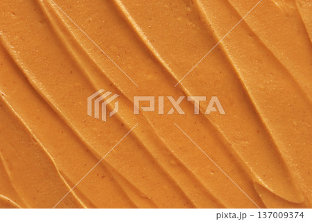 Smooth Peanut Butter Texture With Creamy Swirls In A Rich Golden Brown Spread 137009374