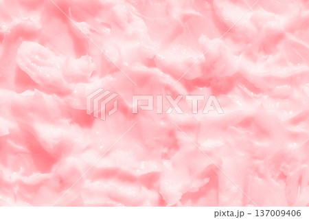 Pink textured cream surface with folds and swirls creating a soft abstract background 137009406