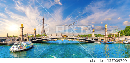 Front panorama of Alexandre III Bridge with Eiffel Tower and tour Boats on the Seine River, Paris, France Front panorama of Alexandre III Bridge with Eiffel Tower and tour Boats on the Seine River, Paris, France 137009799