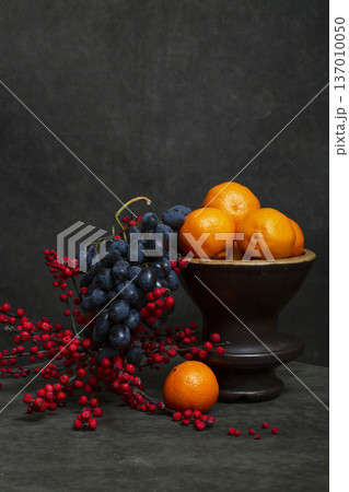 Still life with tangerines, grapes, and red viburnum 137010050