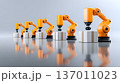 A series of robotic arms engaged in precision tasks in an automated industrial setting, showcasing advanced technology and efficiency in modern manufacturing processes. 137011023