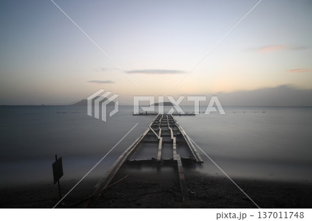sunset on the beach. Seaside town of Turgutreis and spectacular sunsets. Selective Focus. Long Exposure shoot. tranquility scene. sunset on the beach. Seaside town of Turgutreis and spectacular sunsets. Selective Focus. Long Exposure shoot. tranquility scene. 137011748