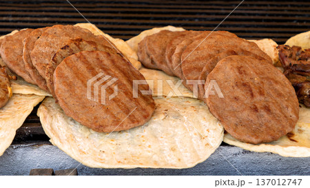 Grilled meat hamburgers sold on market Grilled meat hamburgers sold on market 137012747