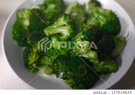 Fresh Broccoli Head on Rustic Surface Fresh Broccoli Head on Rustic Surface 137014634