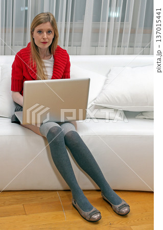 Working on a computer from home 137015441