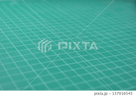 green cutting mat board background with line and scale measure guide pattern for object art design green cutting mat board background with line and scale measure guide pattern for object art design 137016545