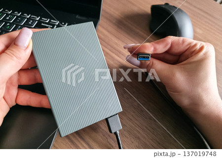 External hard drive for storing large amounts of information. Additional electronic data storage device. High quality photo 137019748