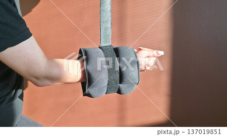 Foot and forearm weights for sports. Exercise weights. Sports accessories. Healthy lifestyle. High quality photo Foot and forearm weights for sports. Exercise weights. Sports accessories. Healthy lifestyle. High quality photo 137019851