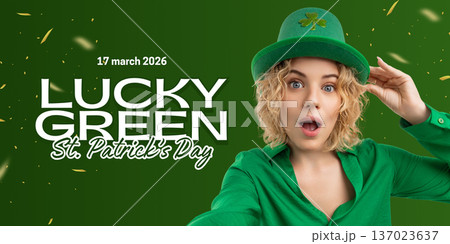 Girl wears a green costume and a hat for St Patricks Day Girl wears a green costume and a hat for St Patricks Day 137023637