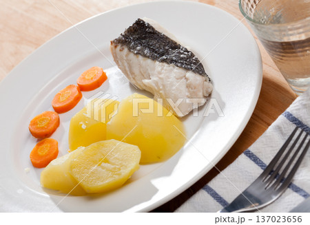 Steamed whiting with potato and carrots Steamed whiting with potato and carrots 137023656