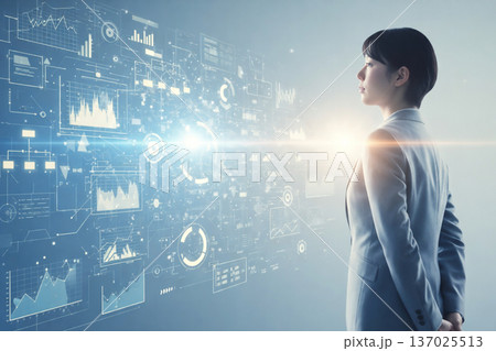 ホログラムのデータパネルを操作・分析するビジネスパーソン ホログラムのデータパネルを操作・分析するビジネスパーソン 137025513