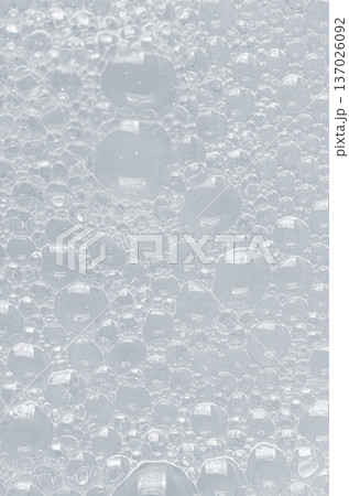 Bubbles of body gel or shampoo or shaving gel. Closeup. Bubbles of body gel or shampoo or shaving gel. Closeup. 137026092