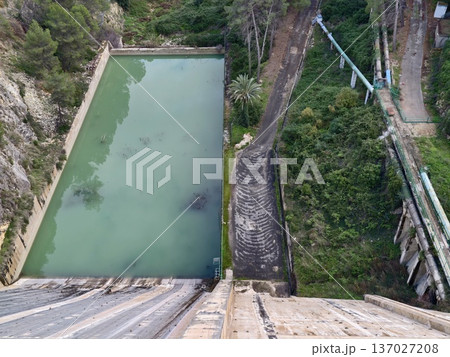 Drone captures infrastructure, Aerial view of dam features, Highangle shot of spillway structure 137027208