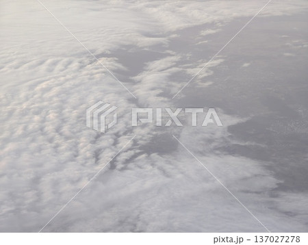 Gentle cloud cover with luminous aura, Vast white cloud canopy casting peaceful and luminous atmosphere Gentle cloud cover with luminous aura, Vast white cloud canopy casting peaceful and luminous atmosphere 137027278