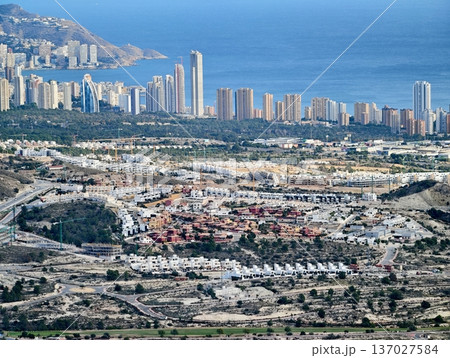 Housing patchwork near ocean and greens, Developer observes sprawling area of houses and seaside greens Housing patchwork near ocean and greens, Developer observes sprawling area of houses and seaside greens 137027584