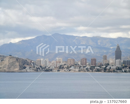 Coastal tower with peaceful bay, Distinctive tower rising over tranquil water and adjoined neighborhoods Coastal tower with peaceful bay, Distinctive tower rising over tranquil water and adjoined neighborhoods 137027660