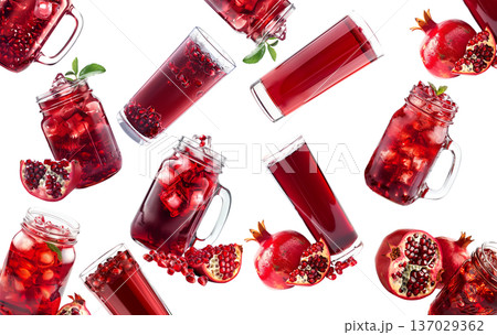 Pomegranate juice jars with ice and fruits isolated on white background, concept of natural freshness Pomegranate juice jars with ice and fruits isolated on white background, concept of natural freshness 137029362
