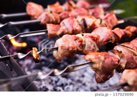 juicy kebabs on skewers, grilled juicy kebabs on skewers, grilled 137029890