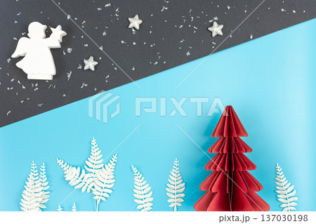 Christmas background with origami paper tree on paper background, flat lay. 137030198