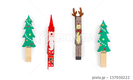 Christmas clothespins on white background isolated, flat lay. 137030222