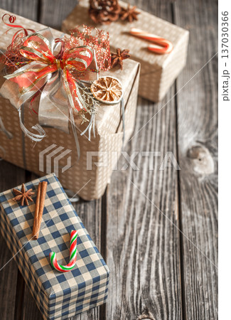 Christmas gift boxes on wooden background 137030366