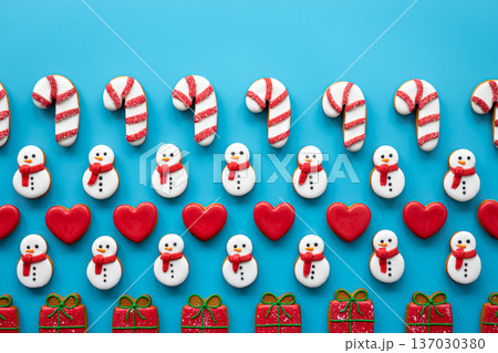 Christmas gingerbread on a blue background, flat lay. Christmas gingerbread on a blue background, flat lay. 137030380