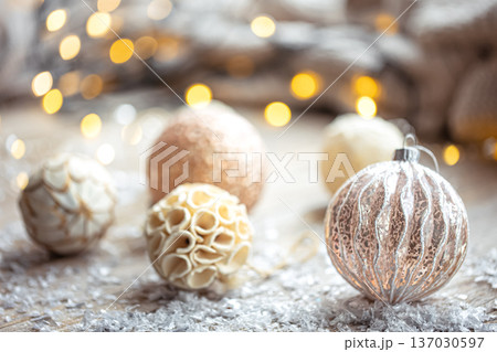 Festive background with Christmas balls and blurred bokeh lights. Festive background with Christmas balls and blurred bokeh lights. 137030597