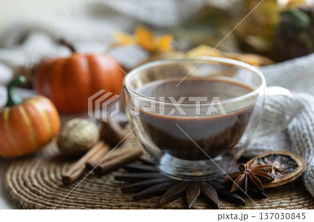 Autumn composition with a cup of hot drink close-up. Autumn composition with a cup of hot drink close-up. 137030845