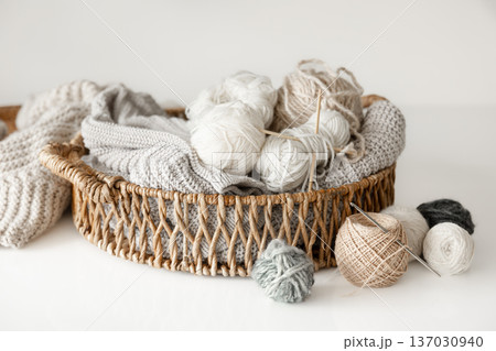 Basket with yarn close-up, threads for knitting. Basket with yarn close-up, threads for knitting. 137030940
