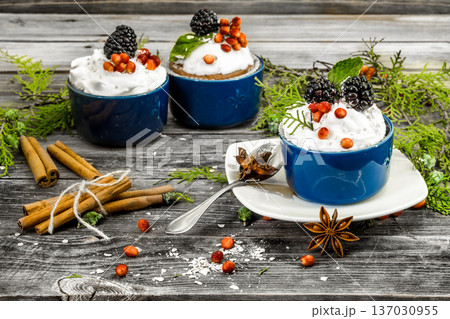 beautiful Christmas cupcake with cream and berry 137030955