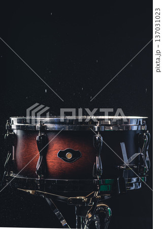 Beautiful snare drum on a black background, close up. Beautiful snare drum on a black background, close up. 137031023