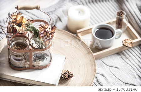 book with a cup of coffee on the bed in the home interior book with a cup of coffee on the bed in the home interior 137031146