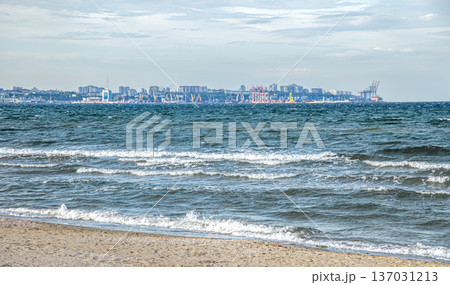Beautiful sea in windy weather with waves in the city. Beautiful sea in windy weather with waves in the city. 137031213