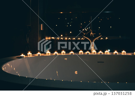 Burning candles in the bathroom in the dark. Burning candles in the bathroom in the dark. 137031258