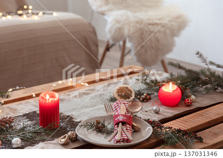 Table setting for a festive Christmas dinner. Table setting for a festive Christmas dinner. 137031346