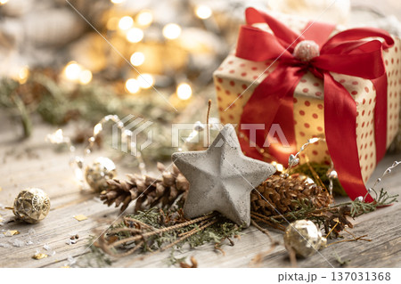 Christmas background with gift box and decor details. Christmas background with gift box and decor details. 137031368