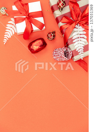 Christmas background with gift boxes and decor details, flat lay. 137031369