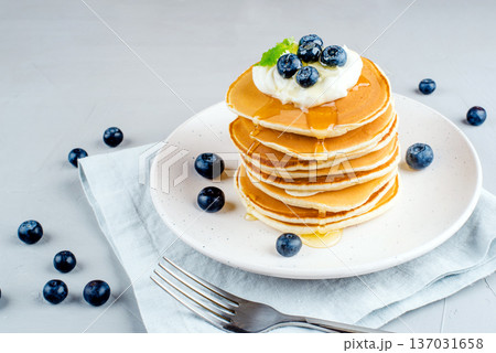Stack of pancakes with fresh blueberry. Stack of pancakes with fresh blueberry. 137031658