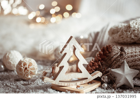 Cozy winter background with wooden decor details and bokeh. 137031995