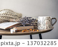 Cozy home composition with a cup, books and dried lavender flowers. 137032285