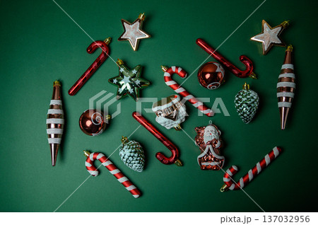 Festive Green Background with Holiday Ornaments and Text Field 137032956