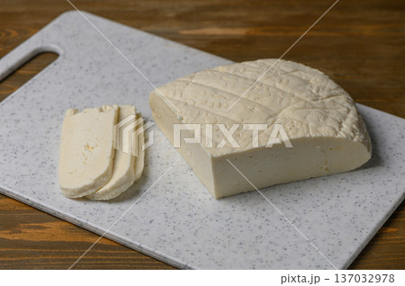Georgian Homemade Sulguni Cheese on Kitchen Table Georgian Homemade Sulguni Cheese on Kitchen Table 137032978
